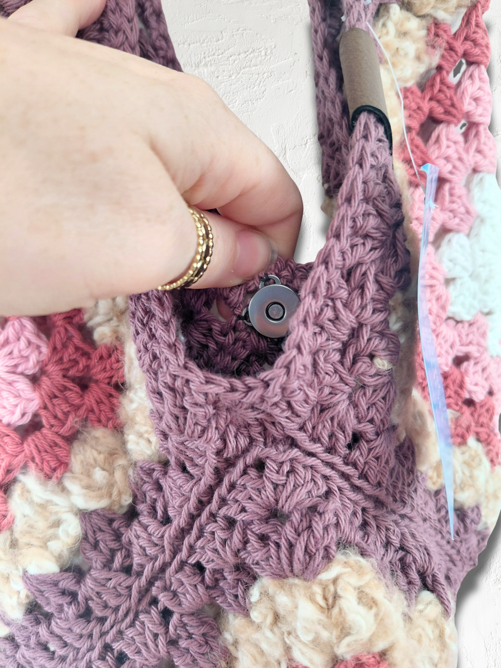 Small fluffy tote bag with button clasp